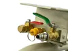 Close-up view of pneumatic fittings and valves on a beige colored device. Voir les images du produit