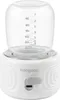 A white portable bottle warmer with a clear glass top. Produktbild-Vorschau