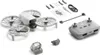 A white DJI drone and its accessories are laid out on a white background. Produktbild-Vorschau