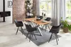 A dining room with a table and chairs set up. Produktbild-Vorschau