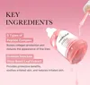 A bottle of pink serum with a dropper, surrounded by text describing its key ingredients and benefits. Voir les images du produit