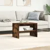 A dark wood-effect coffee table with books and drinks on it, placed in front of a sofa in a living room. Produktbild-Vorschau