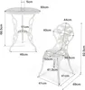 A white metal bistro set with a table and two chairs, featuring rose patterns and dimension labels. Náhľad obrázku produktu