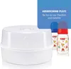 A white microwave sterilizer with two baby bottles next to it, and a blue overlay with text. Anteprima dell’immagine prodotto
