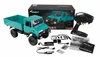 A teal Mercedes-Benz Unimog remote-controlled truck with its accessories and packaging, laid out on a white background. Anteprima dell’immagine prodotto