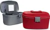 Two beauty cases, one open and gray, the other closed and red, are shown against a white background. Produktbild-Vorschau
