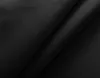 A close-up view of black fabric, folded to show its texture and drape. Produktbild-Vorschau
