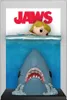 A Funko Pop! vinyl figure depicting a scene from the movie Jaws, with a shark emerging from the water towards a swimmer. Produktbild-Vorschau