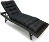 A black chaise lounge cushion on a brown wicker chaise lounge. Náhled obrázku produktu