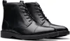 A pair of black leather boots on a white background. Produktbild-Vorschau
