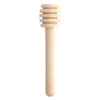 A wooden honey dipper stick is shown against a white background. Podgląd zdjęcia produktu