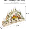 A wooden LED light arch with a Christmas village scene and figures. Produktbild-Vorschau