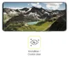A smartphone screen displaying a mountain landscape, with a graphic icon and text below. Produktbild-Vorschau
