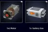 Two electronic components, a motor and a battery box, are displayed against a dark background. Produktbild-Vorschau