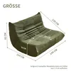 A green sofa with dimensions indicated by lines and text. Produktbild-Vorschau