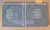 A flat lay of a cast iron stove top plate with concentric circles indicating burner sizes. Náhľad obrázku produktu
