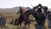 A medieval battle scene with soldiers on horseback fighting with swords and shields in a desert landscape. Náhled obrázku produktu