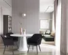 A dining area with a round table and chairs, adjacent to a living area with a sectional sofa. Produktbild-Vorschau