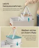A person is shown removing a laundry basket insert from a larger laundry basket, with text describing the ease of removal and secure placement. Produktbild-Vorschau