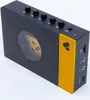 A product shot of a portable cassette player with a gold accent. Náhled obrázku produktu