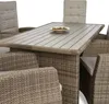 A close-up view of a wicker dining set with a table and chairs, set against a white background. Náhled obrázku produktu