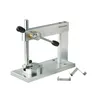 A close-up studio shot of a Proxxon Micro-Press MP 120 with accessories. Produktbild-Vorschau