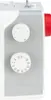 Close-up view of the control dials and a red spool on a white and gray sewing machine. Produktbild-Vorschau