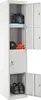 A tall, gray metal locker with multiple compartments, some of which are open to reveal items inside. Náhľad obrázku produktu