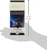 A hand holding a box of Lindt Excellence chocolate. Produktbild-Vorschau