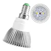 A close-up view of an LED plant grow light with a silver heatsink and a white base, set against a white background. A magnified inset shows the array of LEDs. Produktbild-Vorschau