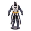 A full-body shot of a Batman action figure wearing a winter coat and mask, standing on a black circular base. Podgląd zdjęcia produktu