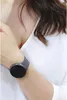 A close-up shot of a person's wrist wearing a smartwatch. Náhľad obrázku produktu