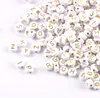 Buchstaben Perlen, 30 Stück, 4x7 mm, gold mit weiß, rund, Produktbild-Vorschau 4