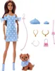 A Barbie doll and her dog are shown with accessories. Podgląd zdjęcia produktu