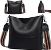 Multiple views of a black leather handbag. Náhľad obrázku produktu