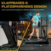 A man is running on a treadmill in a home gym setting, with a folded treadmill shown in the foreground. Produktbild-Vorschau