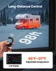 A RV parked in a snowy landscape with a remote control and a display panel shown in the foreground. Voir les images du produit