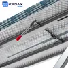 A close-up view of the underside of a folding ironing board, showing its metal frame and locking mechanism. Produktbild-Vorschau