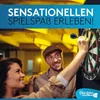 A couple playing darts in a bar or entertainment venue. Anteprima dell’immagine prodotto