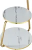 A close-up view of a two-tiered side table with a marble-look top and gold-colored metal legs. Voir les images du produit