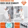 Two women using a shower chair in a bathroom setting. Produktbild-Vorschau