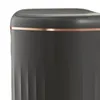 A close-up view of the top portion of a dark gray trash can with a copper accent band. Produktbild-Vorschau