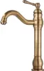 A close-up studio shot of a single antique brass faucet against a white background. Náhľad obrázku produktu