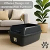 A dark gray cat litter box is placed on a wooden floor in a living room setting, with a sofa and a potted plant in the background. Produktbild-Vorschau