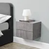 A modern bedroom setting with a wall-mounted nightstand next to a bed. Anteprima dell’immagine prodotto