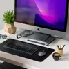A clean and organized desk setup featuring an Apple iMac, keyboard, mouse, and a plant. Podgląd zdjęcia produktu