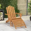 An outdoor patio scene with a wooden Adirondack chair and footrest. Náhled obrázku produktu