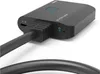 A close-up shot of a black HDMI splitter with a connected cable. Voir les images du produit