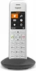 A white Gigaset cordless phone is shown in its charging cradle against a white background. Voir les images du produit