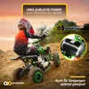 A child riding a green quad bike on a sandy hill. Produktbild-Vorschau